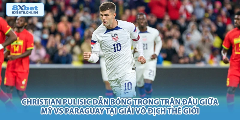 Christian Pulisic dẫn bóng trong trận đấu giữa Mỹ vs Paraguay tại giải vô địch thế giới.